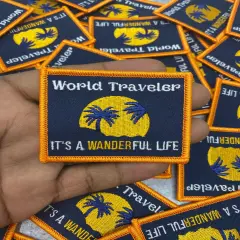 "World Traveler..It's a Wanderful Life" Iron-on Embroidered Patch, Lovers of Travel, Size 2" inches
