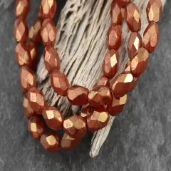 *20* 5x7mm Gold Lustered Red Fire Polished Faceted Oval Beads
