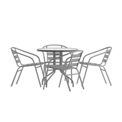 Emma and Oliver Rhea 31.5'' Round Glass Top Metal Table with 4 Aluminum Slat Stack Chairs Silver