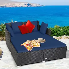 Spacious Outdoor Rattan Daybed With Upholstered Cushions And Pillows Navy
