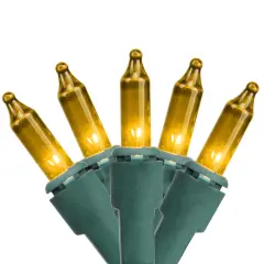 Merry and Light 100-Count Amber Gold Everglow Mini Christmas Light Set, 18ft Green Wire Clear