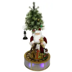 Northlight LED Lighted Musical Santa Claus with Rotating Train Christmas Decoration - 48" Red