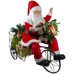 Northlight 32" Pre-Lit LED Animated and Musical Santa Claus Riding a Tricycle Christmas Figurine Red