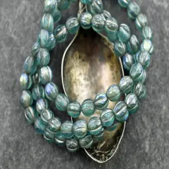 *25* 6mm Platinum Washed Matte Teal AB Faceted Round Melon Beads