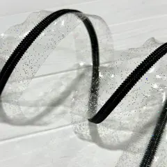 Clear holographic sparkle vinyl zipper tape with black teeth