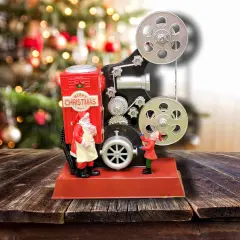 Santa with Movie Projector with LED Lights. Christmas Village