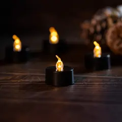 24 Pieces Black Tea Lights Candles &ndash; Flickering Warm Yellow Lights Flameless LED Candles &ndash; Long Lasting Battery Operated Fake Candles &ndash; Decoration for Wedding, Halloween and Christmas
