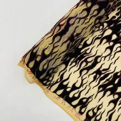 1 Yard Power Mesh Fabric with Black Flocked Flame and Red Glitter Design 60 Inch Width Nude