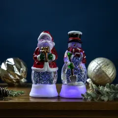 Northlight LED Lighted Color Changing Santa and SnowmanAcrylic Christmas Snow Globes - 6.25" - Set of 2 Red