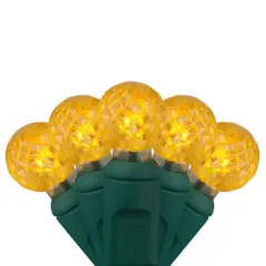 70 Gold G12 LED String Lights, Green Wire, 4" Spacing