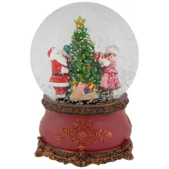 Northlight Santa and Mrs. Claus Decorating Christmas Tree Musical Snow Globe - 6" Red