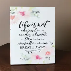 Dexsa Lela & Ollie Life is not measured by the number of breaths we take, but by the moments that take our breath away 6" x 9" Wood Plaque with Easel