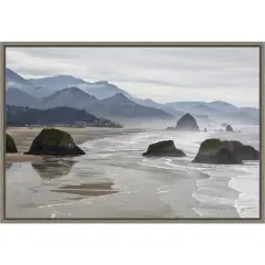 Cannon Beach fog rises over the coastline by Jaynes Gallery Danita Delimont 23-in. W x 16-in. H. Canvas Wall Art Print Framed in Grey