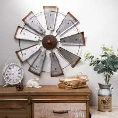 Glitzhome&reg; 22" Farmhouse Metal Galvanized Wind Spinner Wall D&eacute;cor