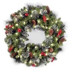 24" Crestwood&reg; Spruce Wreath with Silver Bristle, Pine Cones, Red Berries & Glitter with Warm White LED Lights