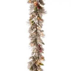 9ft. Pre-lit Snowy Bedford Pine Artificial Christmas Garland with Cedar Leaves, Red Berries, Mixed Cones & 70 Warm White Battery Operated LED Lights w/Timer