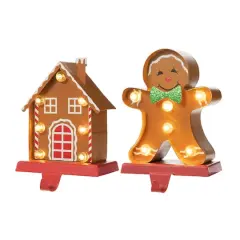 Glitzhome&reg; Marquee LED Gingerbread House & Gingerbread Man Christmas Stocking Holder Set