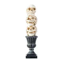 Glitzhome&reg; 18"H Halloween Resin Stacked Skull Table Decor