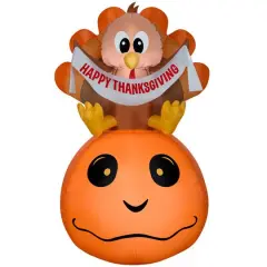 5ft. Airblown&reg; Inflatable Harvest Turkey & Pumpkin with Banner Scene