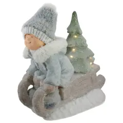 15" Beige & Green Lighted Boy on a Sled Christmas Decoration