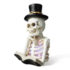 Glitzhome&reg; 10" Lighted Halloween Resin Skull Reading Book Table D&eacute;cor
