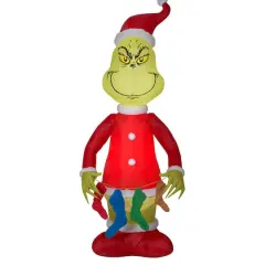 6.5ft. Airblown&reg; Inflatable Grinch Holding String of Stockings