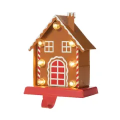 Glitzhome&reg; 6.75'' Marquee LED Gingerbread House Metal Christmas Stocking Holder