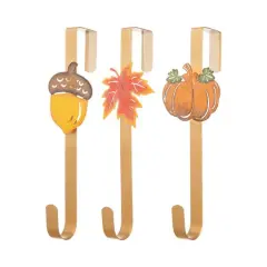 Glitzhome&reg; 14" Fall Metal Acorn, Leaf & Pumpkin Wreath Hanger Set