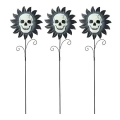 Glitzhome&reg; 24" Halloween Metal Sunflower Skulls Glow-in-Dark Yard Stakes, 3ct.