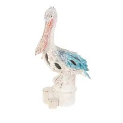 13.25" Pelican Textured Decorative Sculpture with Feathers & Round Blocks Blue