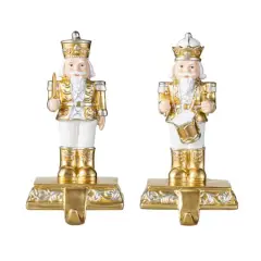 Glitzhome&reg; Christmas Resin Nutcracker Stocking Holder Set