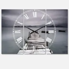 Designart 'Pier And Boats At Seashore Beach Style Multipanel Wall Clock