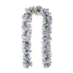 Glitzhome&reg; 9ft Pre-Lit Snow Flocked Greenery Pine Christmas Garland with Timer