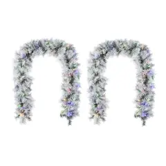 Glitzhome&reg; 6ft Pre-Lit Snow Flocked Greenery Pine Christmas Garland with Timer, 2ct.