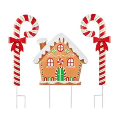 Glitzhome&reg; 33" Metal Christmas Gingerbread House and Candy Cane Yard Stake Set