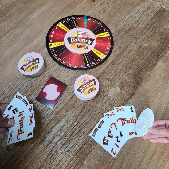 TDC Games The Game of Baloney, A Fibbing Board Game for the Whole Family {2}