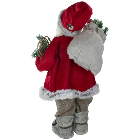 Northlight 2' Standing Santa Christmas Figure Carrying Snow Shoes and Presents Red {6}