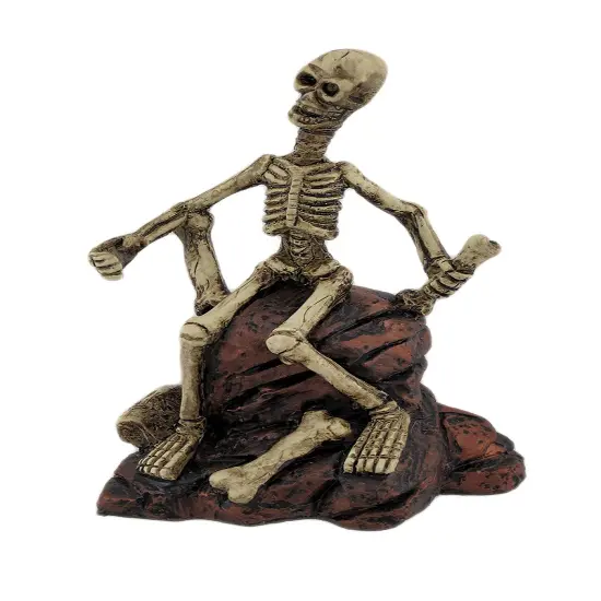 Creepy Skeleton Sitting On Rocks Statue Figure {1}