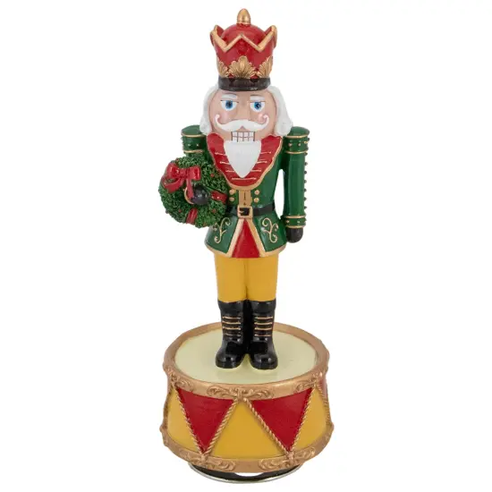 Northlight Musical Revolving Christmas Nutcracker Figure - 8.25" Green {1}