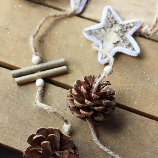 Gallerie II 5' Natural Brown Birch Bark Stars, Twigs and Pine Cone Artificial Christmas Garland - Unlit {3}