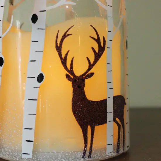 Northlight 10" LED Flameless Pillar Candle in a Clear Glass Bottle Lantern with Deer Accents {5}