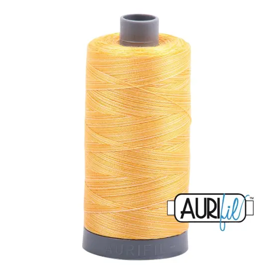 Golden Glow - Variegated (3920) | 28wt Large Spool (750M / 820Y) | Aurifil Thread {1}