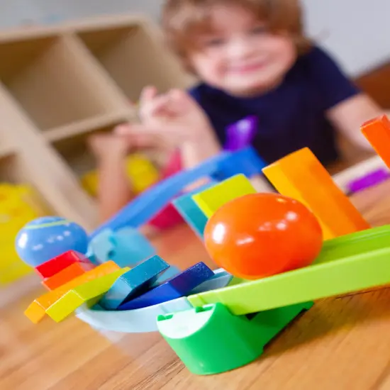 HABA Marble Run Building Set - Kullerbu Kringel Domino Playset, Marble Maze Ball Track with 33 Pieces for 2 Years and Up and Montessori Learning Toy Multicolor {7}