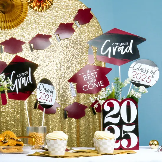 Big Dot of Happiness Maroon Graduation Cap Garland Banner, High School or Elementary Graduate Photo Backdrop, 10 Feet of Cord, 15 Hats with Tassels {3}