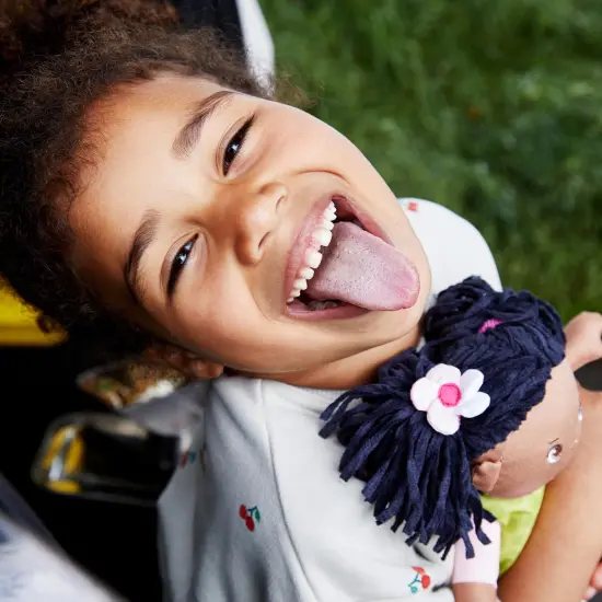 HABA Cari 12" Black Baby Doll with Black Pigtails, Embroidered Face, Removable Green Dress, Machine Washable Soft Baby Doll - 18 Months+ Multicolor {4}