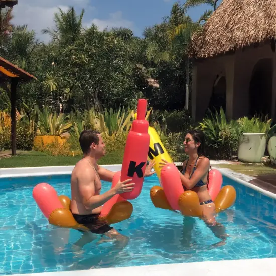 Swim Central Set of 2 Inflatable Hot Dog Ride On Swimming Pool Battle Set with Boppers Game - 56" Red {5}