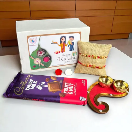 Rakhi Gift Hamper for Brother Bhabhi Raksha Bandhan Set of 2 Ganesha Bracelet Rakhis with Roli Chawal Rakhi Stickers Gift Box Bhaiya Sister In Law Traditional Rakhi Combo {7}