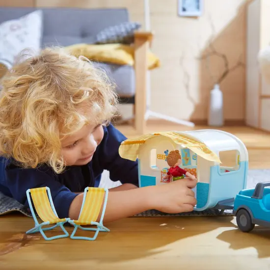 HABA Little Friends Vacation Camper Play Set with All Terrain Push & Go Vehicle, 2 Lawn Chairs and 4" Bendy Boy Doll Figure Multicolor {3}