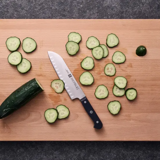 ZWILLING Gourmet 7-inch Hollow Edge Santoku Knife {7}