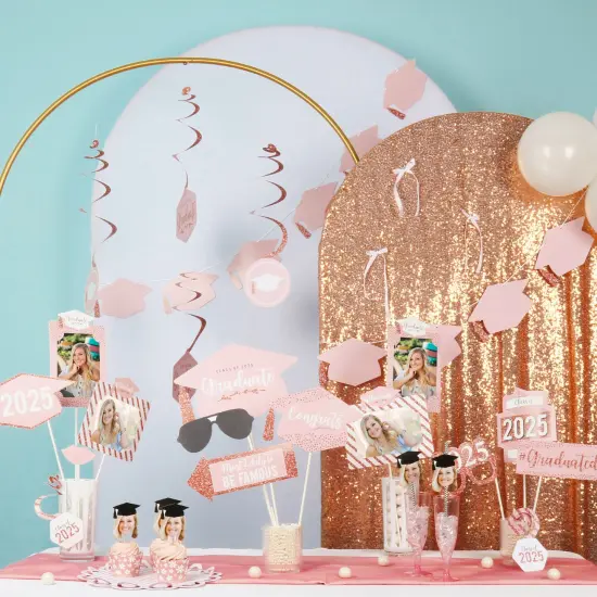 Big Dot of Happiness Rose Gold Graduation Cap Garland Banner, High School or Elementary Grad Photo Backdrop, 10 Feet of Cord, 15 Hats with Tassels {3}